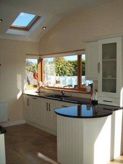 A simple yet effective ivory shaker kitchen installed in Kilkenny by Kitchen Makeover, Ireland