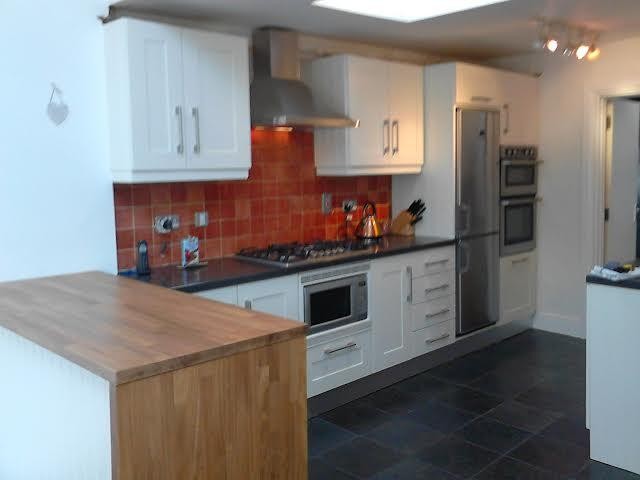 After the makeover of Shane & Orla's kitchen by Kitchen Makeover, Ireland. The kitchen is now bright, fresh, modern and sociable.